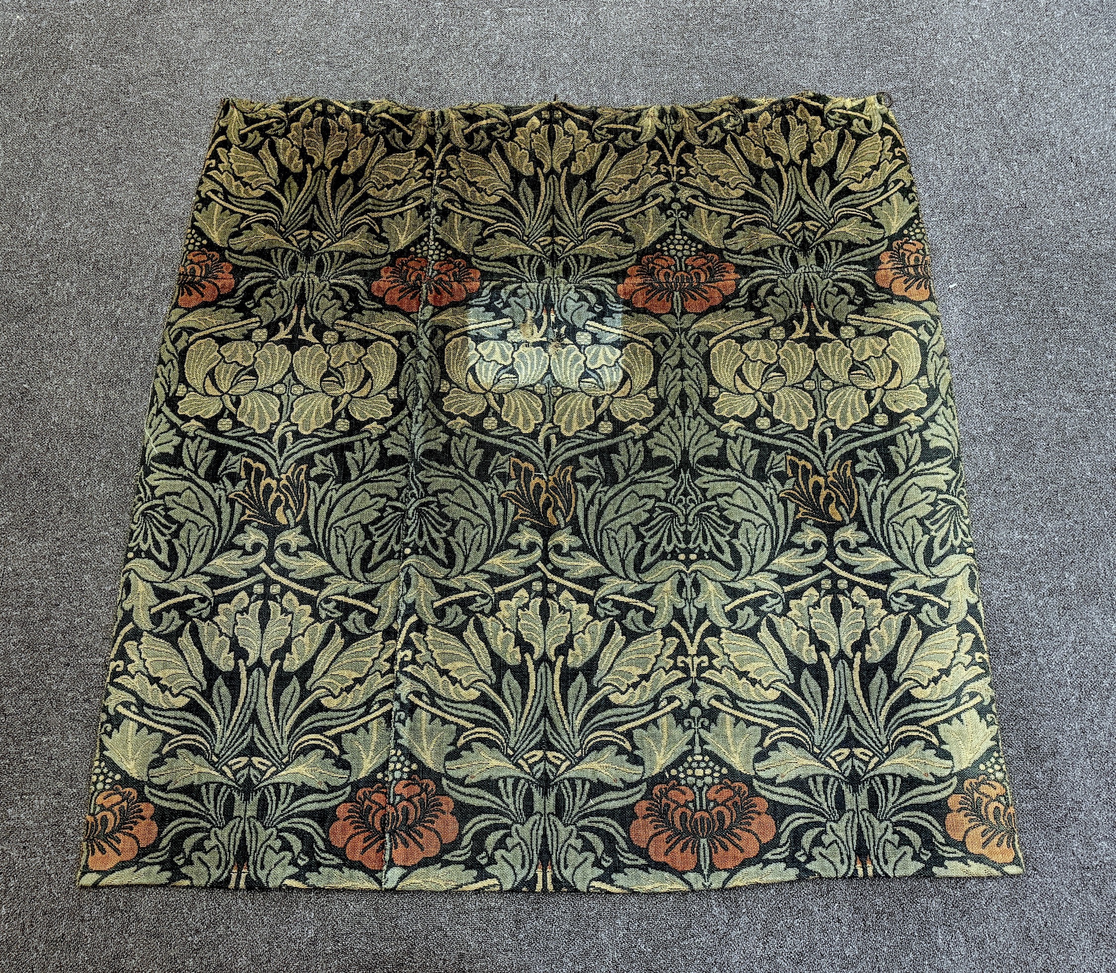 William Morris (1834-1896). Four panels of ‘Tulip and Rose’ triple woven wool and linen mix being two lengths sewn together creating a pair of wider curtains widest curtain (of two panels) 189cm wide x 158cm long, Single